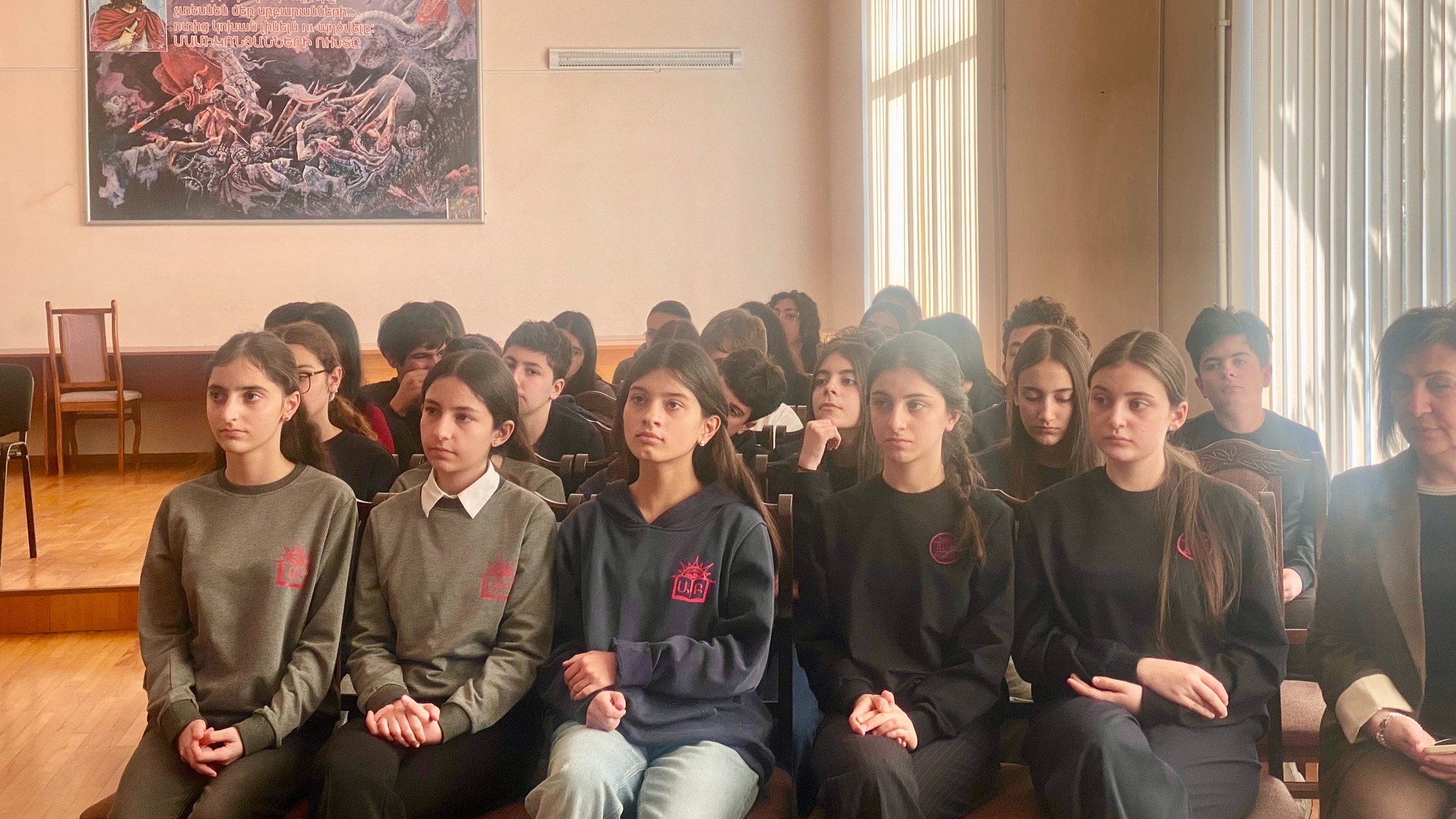 Students at a Swiss Academy in Armenia school meeting